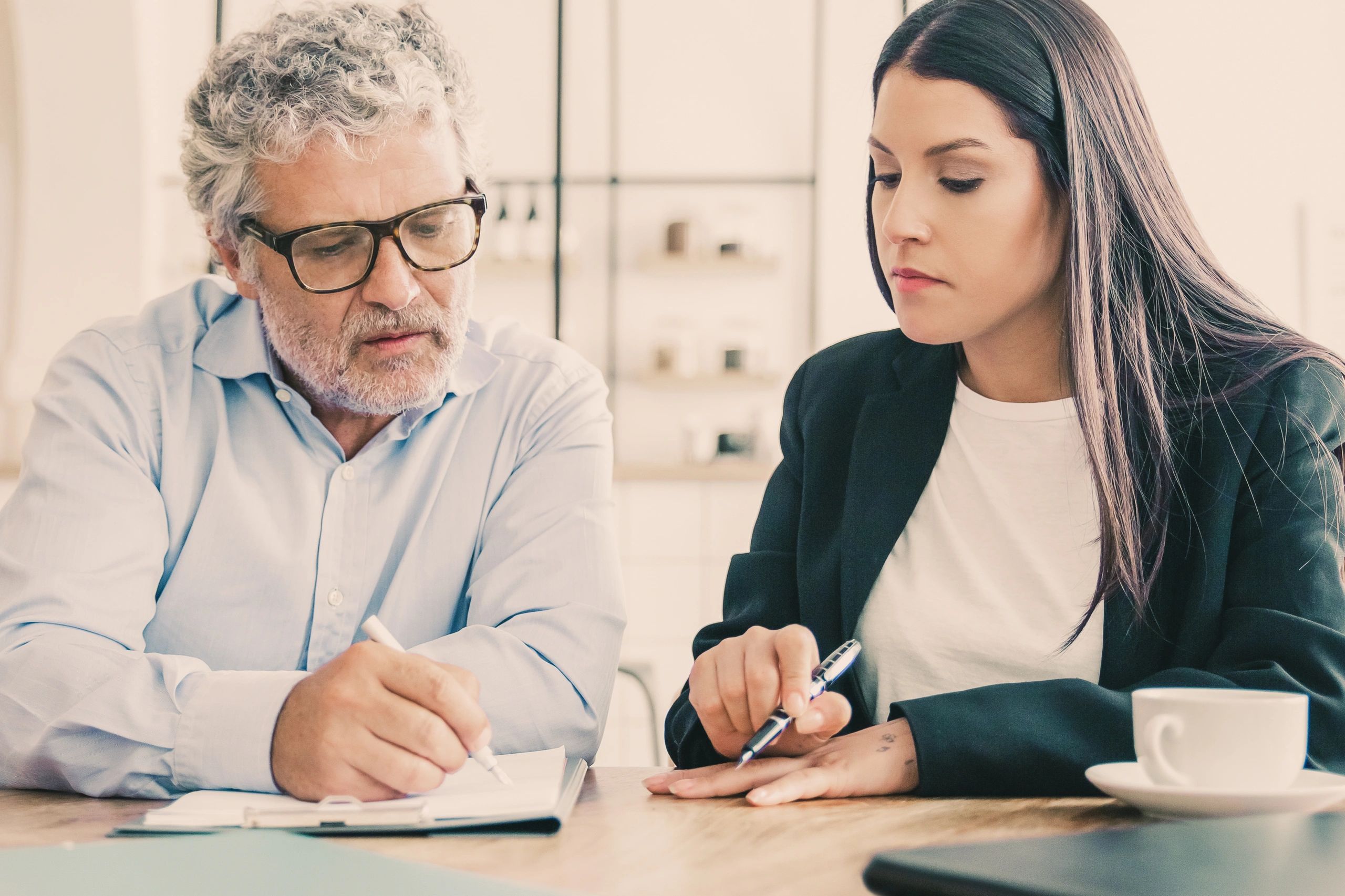 Insurance consultation with client reviewing coverage details