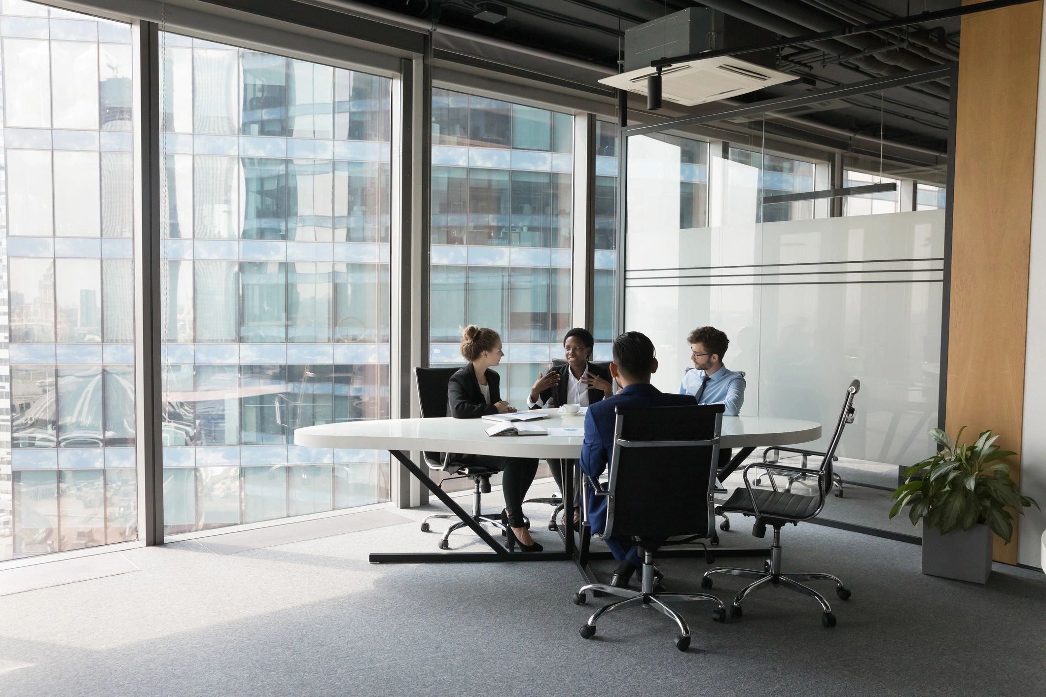 Professional team meeting in a bright office